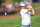 DUBAI, UNITED ARAB EMIRATES - NOVEMBER 19: Rory McIlroy of Northern Ireland plays his second shot on the 14th hole during the final round on Day Four of the of the DP World Tour Championship on the Earth Course at Jumeirah Golf Estates on November 19, 2023 in Dubai, United Arab Emirates. (Photo by David Cannon/Getty Images)