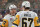 PHILADELPHIA, PENNSYLVANIA - JANUARY 8: Sidney Crosby #87 of the Pittsburgh Penguins talks to Rickard Rakell #67 against the Philadelphia Flyers at the Wells Fargo Center on January 8, 2024 in Philadelphia, Pennsylvania. (Photo by Mitchell Leff/Getty Images)