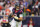 HOUSTON, TX - JANUARY 13: C.J. Stroud #7 of the Houston Texans drops back to pass against the Cleveland Browns during the first half of the AFC Wild Card playoff game at NRG Stadium on January 13, 2024 in Houston, Texas. (Photo by Cooper Neill/Getty Images)