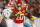 KANSAS CITY, MISSOURI - JANUARY 13: Isiah Pacheco #10 of the Kansas City Chiefs carries the ball during the first half against the Miami Dolphins in the AFC Wild Card Playoffs at GEHA Field at Arrowhead Stadium on January 13, 2024 in Kansas City, Missouri. (Photo by David Eulitt/Getty Images)