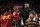 LOS ANGELES, CALIFORNIA - JANUARY 06: Bronny James #6 of the USC Trojans greets his dad, LeBron James of the Los Angeles Lakers, before the game against the Stanford Cardinal at Galen Center on January 06, 2024 in Los Angeles, California. (Photo by Meg Oliphant/Getty Images)