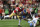 SANTA CLARA, CALIFORNIA - JANUARY 28: Brandon Aiyuk #11 of the San Francisco 49ers catches a pass that was tipped by Kindle Vildor #29 of the Detroit Lions during the third quarter in the NFC Championship Game at Levi's Stadium on January 28, 2024 in Santa Clara, California. (Photo by Ezra Shaw/Getty Images)