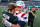 EAST RUTHERFORD, NEW JERSEY - OCTOBER 30: Mac Jones #10 of the New England Patriots and Zach Wilson #2 of the New York Jets hug after a game at MetLife Stadium on October 30, 2022 in East Rutherford, New Jersey. (Photo by Mike Stobe/Getty Images)