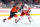 PHILADELPHIA, PENNSYLVANIA - DECEMBER 16: Nick Seeler #24 of the Philadelphia Flyers and Daniel Sprong #17 of the Detroit Red Wings challenge for the puck during the first period at the Wells Fargo Center on December 16, 2023 in Philadelphia, Pennsylvania. (Photo by Tim Nwachukwu/Getty Images)