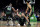 BOSTON, MASSACHUSETTS - NOVEMBER 13: Al Horford #42 of the Boston Celtics and Jayson Tatum #0 of the Boston Celtics help Kristaps Porzingis #8 of the Boston Celtics off the ground against the New York Knicks at TD Garden on November 13, 2023 in Boston, Massachusetts. NOTE TO USER: User expressly acknowledges and agrees that, by downloading and or using this photograph, User is consenting to the terms and conditions of the Getty Images License Agreement. (Photo by Maddie Malhotra/Getty Images)