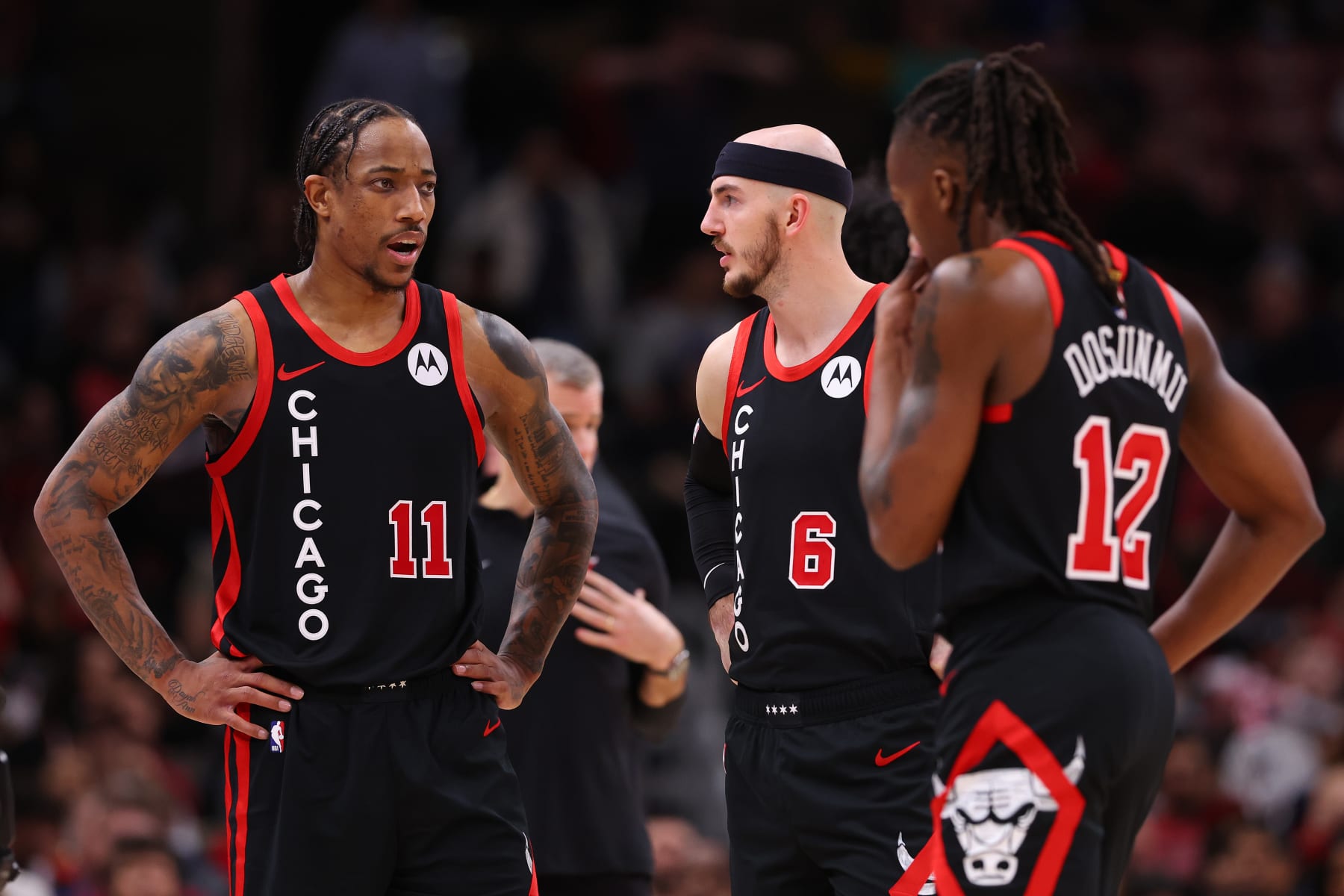 CHICAGO, ILLINOIS - JANUARY 30: DeMar DeRozan #11 of the Chicago Bulls confers with Alex Caruso #6 and Ayo Dosunmu #12 against the Toronto Raptors all throughout the second half of at the United Middle on January 30, 2024 in Chicago, Illinois. NOTE TO USER: Individual expressly acknowledges and agrees that, by downloading and or the utilization of this photograph, Individual is consenting to the terms and conditions of the Getty Photos License Agreement. (Photograph by Michael Reaves/Getty Photos)