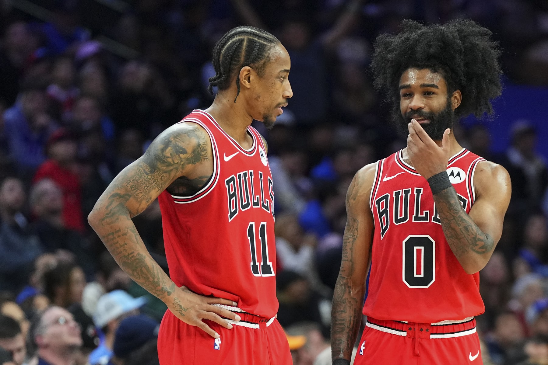 PHILADELPHIA, PENNSYLVANIA - JANUARY 2: DeMar DeRozan #11 of the Chicago Bulls talks to Coby White #0 against the Philadelphia 76ers in the third quarter at the Wells Fargo Middle on January 2, 2024 in Philadelphia, Pennsylvania. The 76ers defeated the Bulls 110-97. NOTE TO USER: Individual expressly acknowledges and agrees that, by downloading and or the utilization of this photograph, Individual is consenting to the terms and conditions of the Getty Photos License Agreement. (Photograph by Mitchell Leff/Getty Photos)