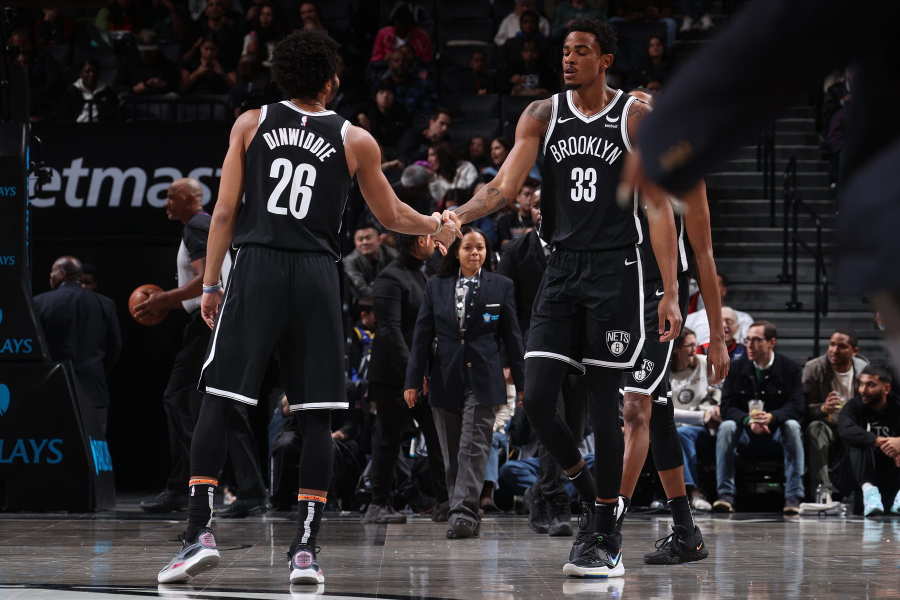 BROOKLYN, NY - NOVEMBER 25: Nicolas Claxton #33 and Spencer Dinwiddie #26 of the Brooklyn Nets excessive five at some level of the game in opposition to the Miami Heat on November 25, 2023 at Barclays Heart in Brooklyn, Original York. NOTE TO USER: Particular person expressly acknowledges and concurs that, by downloading and or the use of this Photo, user is consenting to the terms and conditions of the Getty Pictures License Settlement. Significant Copyright Look: Copyright 2023 NBAE (Photo by Nathaniel S. Butler/NBAE by Getty Pictures)