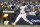 MILWAUKEE, WISCONSIN - OCTOBER 04: Carlos Santana #41 of the Milwaukee Brewers singles during the third inning against the Arizona Diamondbacks during Game Two of the Wild Card Series at American Family Field on October 04, 2023 in Milwaukee, Wisconsin. (Photo by John Fisher/Getty Images)