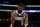 LOS ANGELES, CALIFORNIA - JANUARY 17:  Kyrie Irving #11 of the Dallas Mavericks reacts to a play during the second quarter against the Los Angeles Lakers at Crypto.com Arena on January 17, 2024 in Los Angeles, California. NOTE TO USER: User expressly acknowledges and agrees that, by downloading and or using this photograph, User is consenting to the terms and conditions of the Getty Images License Agreement. (Photo by Katelyn Mulcahy/Getty Images)