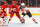 Calgary Flames defenseman Noah Hanifin (left) and Anaheim Ducks center Adam Henrique.