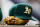 MILWAUKEE, WISCONSIN - JUNE 11: A picture of the Oakland Athletics baseball hat on the dugout step before the game against the Milwaukee Brewers at American Family Field on June 11, 2023 in Milwaukee, Wisconsin. (Photo by John Fisher/Getty Images)
