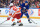 BUFFALO, NY - FEBRUARY 11: Casey Mittelstadt #37 of the Buffalo Sabres controls the puck as Noah Hanifin #55 of the Calgary Flames defends during an NHL game on February 11, 2023 at KeyBank Center in Buffalo, New York. (Photo by Bill Wippert/NHLI via Getty Images)