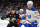 ANAHEIM, CA - JANUARY 23: Ryan Strome #16 of the Anaheim Ducks and Casey Mittelstadt #37 of the Buffalo Sabres battle for position during the first period at Honda Center on January 23, 2024 in Anaheim, California. (Photo by Debora Robinson/NHLI via Getty Images)