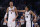 DALLAS, TX - FEBRUARY 14: Victor Wembanyama #1 of the San Antonio Spurs and Devin Vassell #24 of the San Antonio Spurs celebrate a basket against the Dallas Mavericks in the first half at American Airlines Center on February 14, 2024 in Dallas, Texas. NOTE TO USER: User expressly acknowledges and agrees that, by downloading and or using this photograph, User is consenting to the terms and conditions of the Getty Images License Agreement. (Photo by Ron Jenkins/Getty Images)