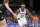 MEMPHIS, TENNESSEE - JANUARY 31: Malcolm Dandridge #23 of the Memphis Tigers drives to the basket against Cameron Sheffield #5 of the Rice Owls during the first half at FedExForum on January 31, 2024 in Memphis, Tennessee. (Photo by Justin Ford/Getty Images)