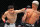 MEXICO CITY, MEXICO - FEBRUARY 24: (L-R) Victor Altamirano of Mexico punches Felipe dos Santos of Brazil in a flyweight fight during the UFC Fight Night event at Arena CDMX on February 24, 2024 in Mexico City, Mexico. (Photo by Josh Hedges/Zuffa LLC via Getty Images)