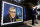 LOS ANGELES, CA - FEBRUARY 22, 2024 - - Lakers great and UCLA alum Kareem Abdul-Jabbar, right, standing next to Basketball Hall of Famer Jamaal Wilkes, makes a presentation at the first-day-of-issue ceremony for a commemorative Forever stamp depicting the late UCLA basketball coach John Wooden held Saturday outside Pauley Pavilion on the UCLA campus in Los Angeles on February 22, 2024. UCLA Chancellor Gene Block, former Bruins' women's gymnastics coach Valorie Kondos Field, Christy Impelman, a granddaughter of Wooden, and Derek Kan, a member of the U.S. Postal Service Board of Governors made presentations to the late UCLA coach. (Genaro Molina/Los Angeles Times via Getty Images)