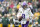 GREEN BAY, WISCONSIN - OCTOBER 29: Kirk Cousins #8 of the Minnesota Vikings looks to throw a pass against the Green Bay Packers in the second half at Lambeau Field on October 29, 2023 in Green Bay, Wisconsin. (Photo by Patrick McDermott/Getty Images)