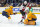 NASHVILLE, TENNESSEE - FEBRUARY 13: Juuse Saros #74 of the Nashville Predators makes a save against Dawson Mercer #91 of the New Jersey Devils during an NHL game at Bridgestone Arena on February 13, 2024 in Nashville, Tennessee. (Photo by John Russell/NHLI via Getty Images)