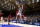 DURHAM, NORTH CAROLINA - FEBRUARY 28: Kyle Filipowski #30 of the Duke Blue Devils goes to the basket against Mike James #0 and Skyy Clark #55 of the Louisville Cardinals during the first half of the game at Cameron Indoor Stadium on February 28, 2024 in Durham, North Carolina. (Photo by Lance King/Getty Images)