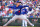 SURPRISE, ARIZONA - FEBRUARY 28: Yoshinobu Yamamoto #18 of the  Los Angeles Dodgers pitches during a game against the Texas Rangers at Surprise Stadium on February 28, 2024 in Surprise, Arizona. (Photo by Masterpress/Getty Images)