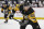 PITTSBURGH, PA - DECEMBER 31: Pittsburgh Penguins left wing Jake Guentzel (59) looks on during the first period in the NHL game between the Pittsburgh Penguins and the New York Islanders on December 31, 2023, at PPG Paints Arena in Pittsburgh, PA. (Photo by Jeanine Leech/Icon Sportswire via Getty Images)