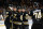BOSTON, MASSACHUSETTS - FEBRUARY 17: David Pastrnak #88 of the Boston Bruins celebrates his goal against the Los Angeles Kings during the first period with teammates Jake DeBrusk #74, Charlie McAvoy #73, Matt Grzelcyk #48 and Pavel Zacha #18 which was eventually overturned a few moments later after video review, at the TD Garden on February 17, 2024 in Boston, Massachusetts. (Photo by Richard T Gagnon/Getty Images)