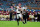 MIAMI GARDENS, FLORIDA - DECEMBER 30: Carson Beck #15 of the Georgia Bulldogs throws a pass in the second quarter against the Florida State Seminoles during the Capital One Orange Bowl at Hard Rock Stadium on December 30, 2023 in Miami Gardens, Florida. (Photo by Megan Briggs/Getty Images)