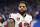 DETROIT, MI - JANUARY 21: Mike Evans #13 of the Tampa Bay Buccaneers looks on prior to an NFL divisional round playoff football game against the Detroit Lions at Ford Field on January 21, 2024 in Detroit, Michigan. (Photo by Kevin Sabitus/Getty Images)