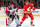 CALGARY, ALBERTA - NOVEMBER 05: Trevor Lewis #22 of the Calgary Flames skates against Vitek Vancek #41 of the New Jersey Devils at Scotiabank Saddledome on November 05, 2022 in Calgary, Alberta. (Photo by Gerry Thomas/NHLI via Getty Images)
