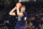 CHICAGO, ILLINOIS - FEBRUARY 14: Donovan Clingan #32 of the Connecticut Huskies looks to pass during the first half \add at Wintrust Arena on February 14, 2024 in Chicago, Illinois. (Photo by Justin Casterline/Getty Images)