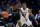 CINCINNATI, OHIO - MARCH 09: Kam Jones #1 of the Marquette Golden Eagles dribbles the ball while being guarded by Dayvion McKnight #20 of the Xavier Musketeers in the first half at the Cintas Center on March 09, 2024 in Cincinnati, Ohio. (Photo by Dylan Buell/Getty Images)
