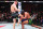 MIAMI, FLORIDA - MARCH 09: (L-R) Jack Della Maddalena of Australia knees Gilbert Burns of Brazil in a welterweight fight during the UFC 299 event at Kaseya Center on March 09, 2024 in Miami, Florida. (Photo by Chris Unger/Zuffa LLC via Getty Images)