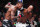 Michael Page punches Kevin Holland