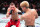 Petr Yan throws a punch at Song Yadong