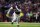 HOUSTON, TEXAS - JANUARY 13: Jonathan Greenard #52 of the Houston Texans runs around the edge during an AFC wild-card playoff football game against the Cleveland Browns at NRG Stadium on January 13, 2024 in Houston, Texas. (Photo by Ryan Kang/Getty Images)