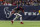 HOUSTON, TEXAS - JANUARY 13: Devin Singletary #26 of the Houston Texans runs with the ball against Greg Newsome II #0 of the Cleveland Browns during an NFL wild-card playoff football game between the Houston Texans and the Cleveland Browns at NRG Stadium on January 13, 2024 in Houston, Texas. (Photo by Michael Owens/Getty Images)