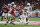 SAN ANTONIO, TX - DECEMBER 28: Noah Fifita #11 of the Arizona Wildcats scrambles against the Oklahoma Sooners in the first half at the Valero Alamo Bowl at the Alamodome on December 28, 2023 in San Antonio, Texas. (Photo by Ronald Cortes/Getty Images)