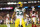 SANTA CLARA, CALIFORNIA - JANUARY 20: Aaron Jones #33 of the Green Bay Packers celebrates after scoring on a two-point conversion during an NFC divisional round playoff football game against the San Francisco 49ers at Levi's Stadium on January 20, 2024 in Santa Clara, California. (Photo by Ryan Kang/Getty Images)