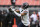 CLEVELAND, OHIO - DECEMBER 17: Darnell Mooney #11 of the Chicago Bears warms up prior to a game against the Cleveland Browns at Cleveland Browns Stadium on December 17, 2023 in Cleveland, Ohio. (Photo by Nick Cammett/Getty Images)