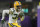 MINNEAPOLIS, MN - DECEMBER 31: Green Bay Packers defensive back Jonathan Owens (34) warms up before an NFL game between the Minnesota Vikings and Green Bay Packers on December 31, 2023, at U.S. Bank Stadium in Minneapolis, MN. (Photo by Nick Wosika/Icon Sportswire via Getty Images)