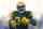 GREEN BAY, WISCONSIN - NOVEMBER 19: Jonathan Owens #34 of the Green Bay Packers celebrates in the fourth quarter against the Los Angeles Chargers at Lambeau Field on November 19, 2023 in Green Bay, Wisconsin. (Photo by Patrick McDermott/Getty Images)
