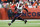 Denver, CO - December 24: New England Patriots TE Pharaoh Brown runs with the ball in the first half. The Patriots beat the Denver Broncos, 26-23. (Photo by Danielle Parhizkaran/The Boston Globe via Getty Images)