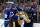 BOSTON, MASSACHUSETTS - MARCH 7: Jake McCabe #22 of the Toronto Maple Leafs and teammate Matthew Knies #23 tangle with Jake DeBrusk #74 of the Boston Bruins during the first period at the TD Garden on March 7, 2024 in Boston, Massachusetts. The Bruins won 4-1. (Photo by Richard T Gagnon/Getty Images)