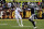 LANDOVER, MD - JANUARY 07: Washington Commanders quarterback Sam Howell (14) in action against Dallas Cowboys safety Jayron Kearse (1) during the NFL game between the Dallas Cowboys and the Washington Commanders on January 7, 2024 at Fed Ex Field in Landover, MD. (Photo by Mark Goldman/Icon Sportswire via Getty Images)