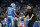 DETROIT, MICHIGAN - JANUARY 14: Donovan Peoples-Jones #19 of the Detroit Lions shakes hands with Head coach Dan Campbell prior to a game against the Los Angeles Rams in the NFC Wild Card Playoffs at Ford Field on January 14, 2024 in Detroit, Michigan. (Photo by Nic Antaya/Getty Images)