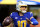 INGLEWOOD, CALIFORNIA - DECEMBER 10: Justin Herbert #10 of the Los Angeles Chargers prepares to pass during a 24-7 loss to the Denver Broncos at SoFi Stadium on December 10, 2023 in Inglewood, California. (Photo by Harry How/Getty Images)
