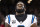 NEW ORLEANS, LA - DECEMBER 10: Brian Burns #0 of the Carolina Panthers looks on from the sideline during the national anthem prior to an NFL football game against the New Orleans Saints at Caesars Superdome on December 10, 2023 in New Orleans, LA. (Photo by Perry Knotts/Getty Images)