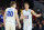 OMAHA, NEBRASKA - MARCH 21: Spencer Johnson #20 and Dallin Hall #30 of the Brigham Young Cougars talk during the game against the Duquesne Dukes in the first round of the NCAA Men's Basketball Tournament at CHI Health Center on March 21, 2024 in Omaha, Nebraska. (Photo by Michael Reaves/Getty Images)